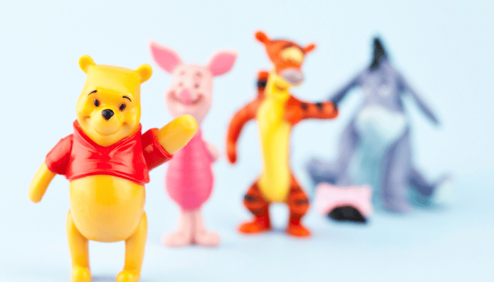 Photo of miniature Pooh, Piglet, Tigger, and Eeyore